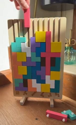 Montessori Wooden Tetris Children's Toy photo by Darren A.: My child loves puzzles, but this one keeps them engaged long…
